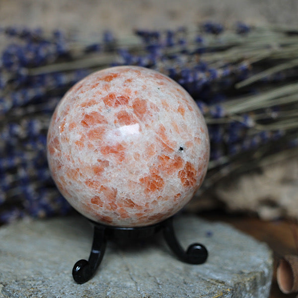 zonnesteen bol rood en wit met flash