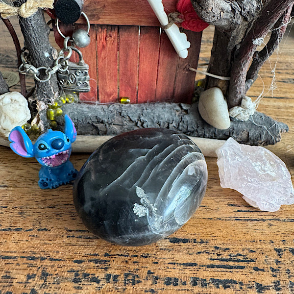 Maansteen Zwart Gepolijst hand steen edelstenenmineralenwinkel.nl