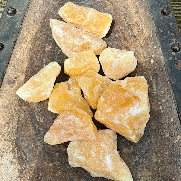 calciet oranje ruw brokje mexico edelstenenmineralenwinkel