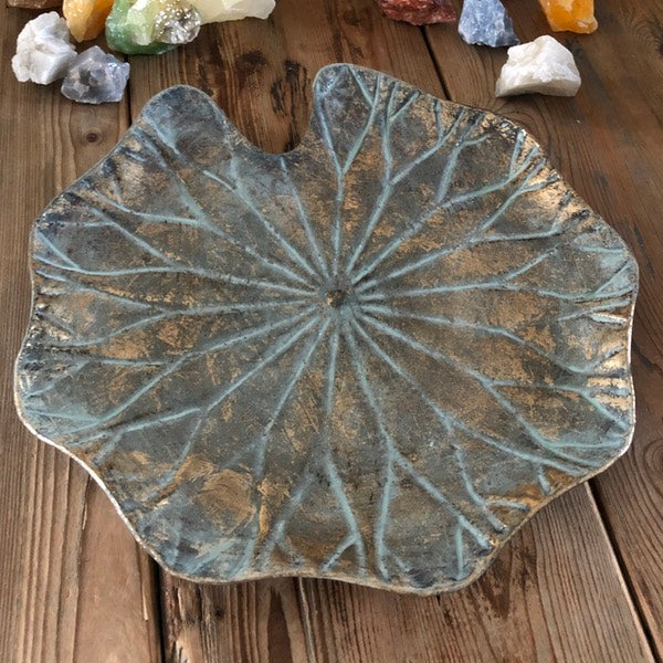 de sfeermakers schaal met antiek gouden look