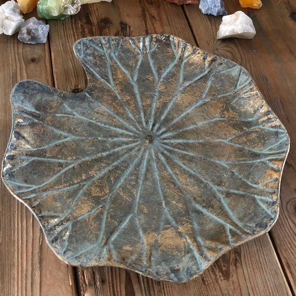 de sfeermakers schaal met antiek gouden look