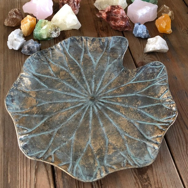 de sfeermakers schaal met antiek gouden look