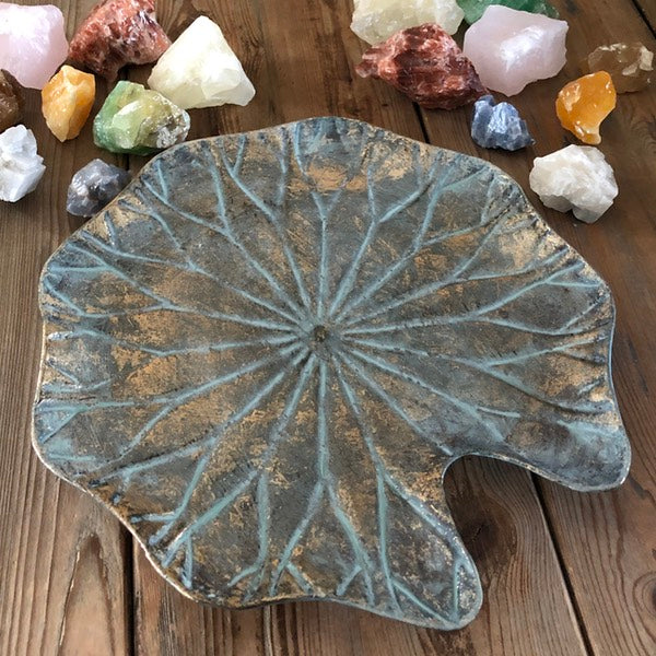 de sfeermakers schaal met antiek gouden look