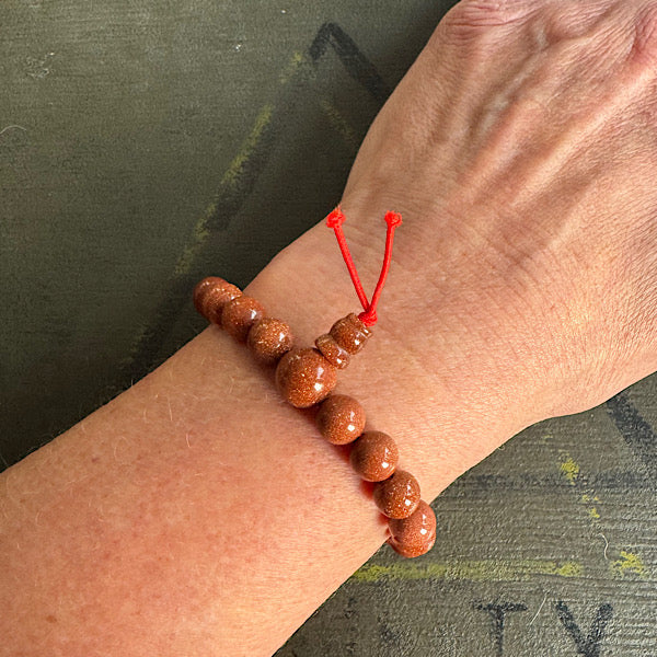 goudsteen rood synthetisch armband kralen sieraad