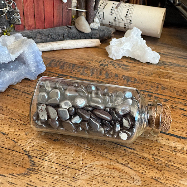 hematiet ontlaad steentjes fles